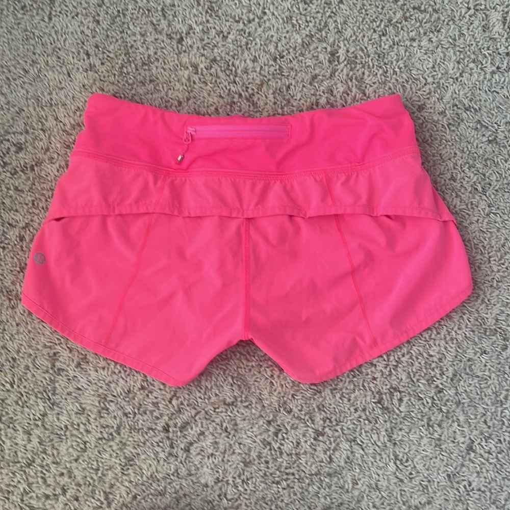 Pink lululemon speed up shorts